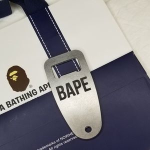 Stainless steel BAPE bottle opener.